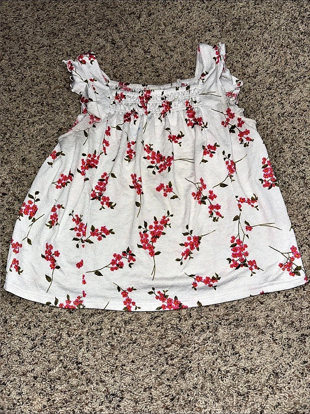 Woman’s spring ruffle sleeveless top